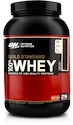 Optimum Nutrition 100% Whey Gold Standard 899 g bílá čokoláda - malina